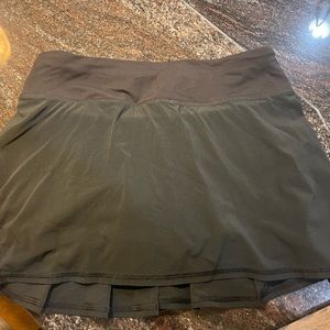 Black Womens Lulu tennis skirt.  Size 4.  Worn less than 5 times.
